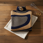 Pull en cachemire avec tourbillon abstrait