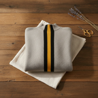 Pull en cachemire noir avec rayures jaunes